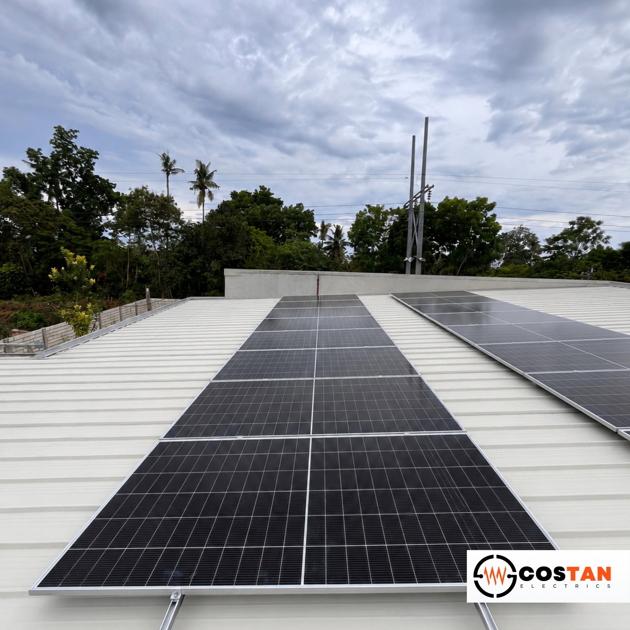 Rooftop solar panels installed by Costan Electrics for a hybrid solar system in Baclayon, Bohol